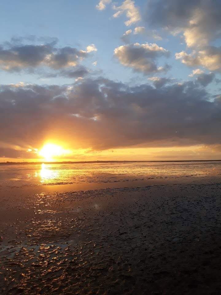 Sonnenuntergang über dem Wattenmeer